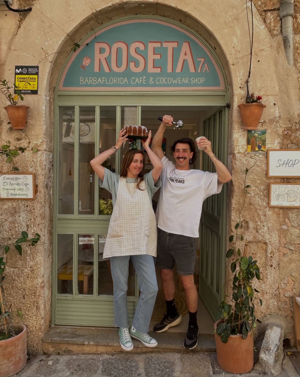 Roseta's storefront on Carrer de la Rosa, two of the team in the doorway